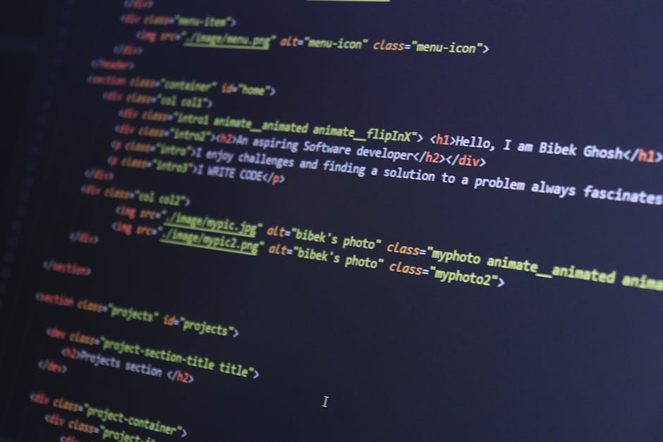 A detailed close-up of a computer screen displaying HTML code with colorful syntax highlighting, featuring lines of code that include headings, links to images labeled 'bibek's photo', and CSS classes